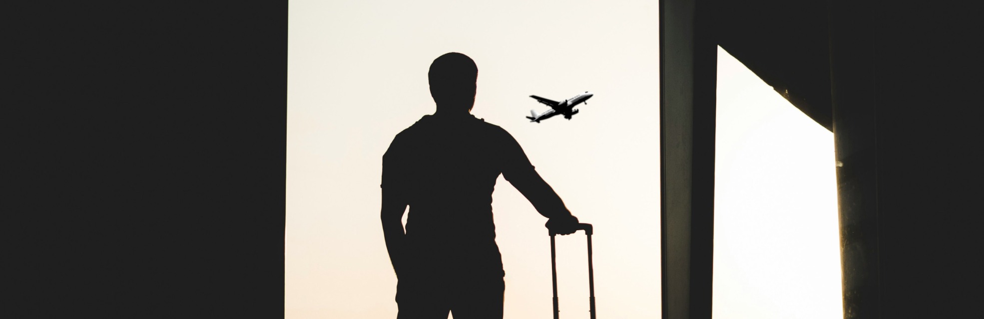 traveller at an airport to represent bleisure travel